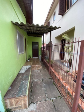 Imagem Casa com 5 Quartos à Venda, 300 m² em Sarandi - Porto Alegre Imagem Casa com 5 Quartos à Venda, 300 m² em Sarandi - Porto Alegre