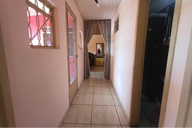 Imagem Casa com 3 Quartos à Venda, 160 m² em Santa Maria Goretti - Porto Alegre Imagem Casa com 3 Quartos à Venda, 160 m² em Santa Maria Goretti - Porto Alegre
