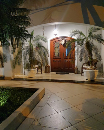 Imagem Casa com 4 Quartos à Venda, 360 m² em Vila Santa Rosa - Guarujá