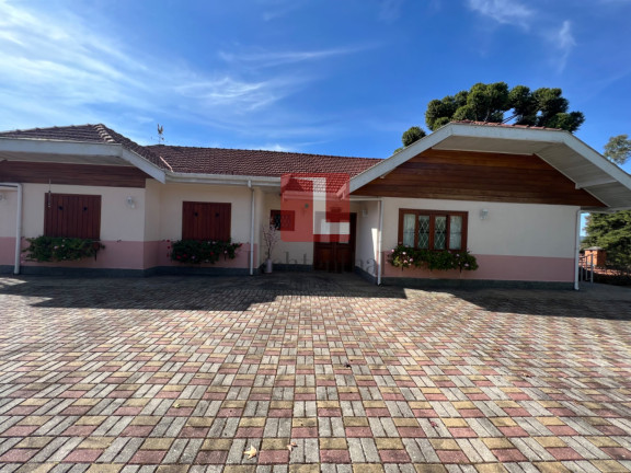 Imagem Casa de Condomínio com 4 Quartos à Venda, 260 m² em Vale Encantado - Campos Do Jordão