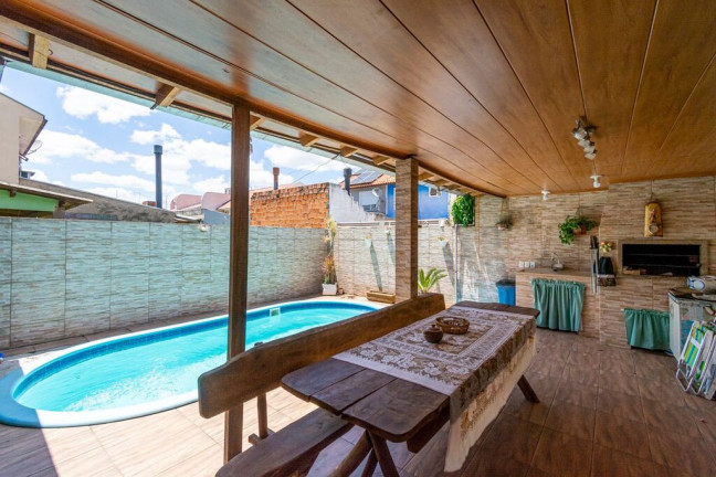Imagem Casa com 4 Quartos à Venda, 165 m² em Igara - Canoas Imagem Casa com 4 Quartos à Venda, 165 m² em Igara - Canoas
