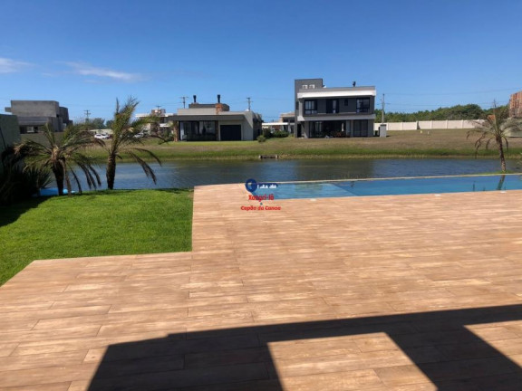 Imagem Casa de Condomínio com 5 Quartos à Venda, 280 m² em Capão Novo - Capão Da Canoa
