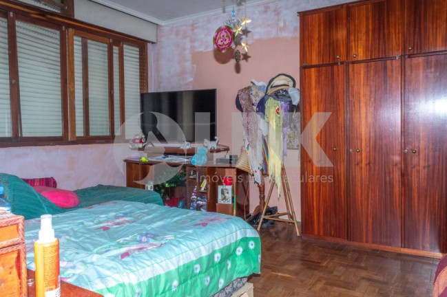Imagem Casa com 5 Quartos à Venda, 251 m² em Santa Maria Goretti - Porto Alegre Imagem Casa com 5 Quartos à Venda, 251 m² em Santa Maria Goretti - Porto Alegre