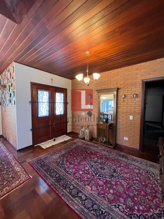 Imagem Casa de Condomínio com 4 Quartos à Venda, 260 m² em Vale Encantado - Campos Do Jordão