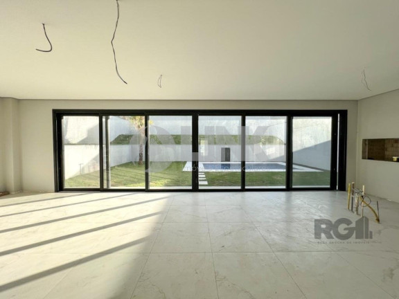 Imagem Imóvel com 4 Quartos à Venda, 371 m² em Vila Nova - Porto Alegre Imagem Imóvel com 4 Quartos à Venda, 371 m² em Vila Nova - Porto Alegre