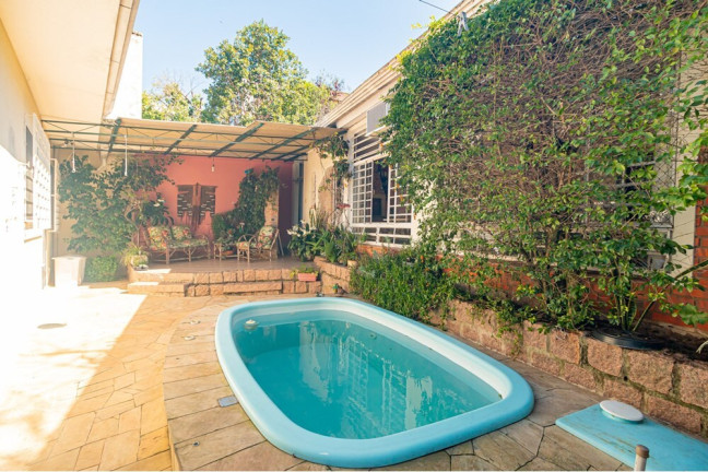 Imagem Casa com 3 Quartos à Venda, 248 m² em Três Figueiras - Porto Alegre Imagem Casa com 3 Quartos à Venda, 248 m² em Três Figueiras - Porto Alegre