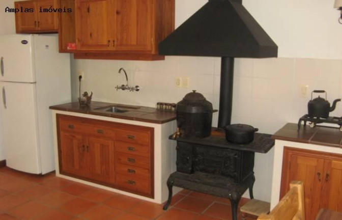 Imagem Imóvel com 4 Quartos à Venda, 1.000 m²
