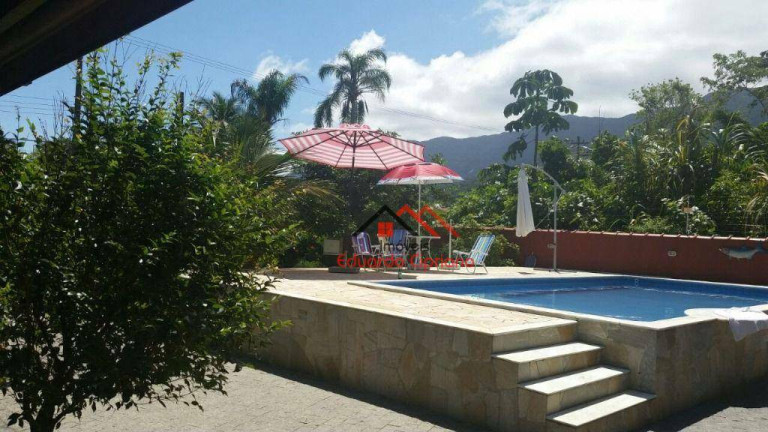 Imagem Casa com 4 Quartos à Venda, 228 m² em Massaguaçu - Caraguatatuba