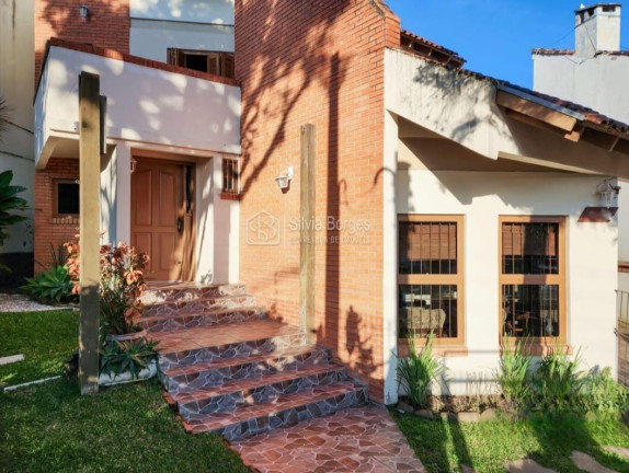 Imagem Sobrado com 3 Quartos à Venda, 209 m² em Ipanema - Porto Alegre