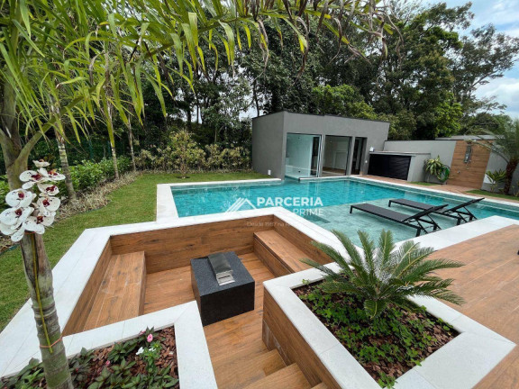 Imagem Casa com 7 Quartos à Venda, 620 m² em Riviera Módulo 16 - Bertioga Imagem Casa com 7 Quartos à Venda, 620 m² em Riviera Módulo 16 - Bertioga