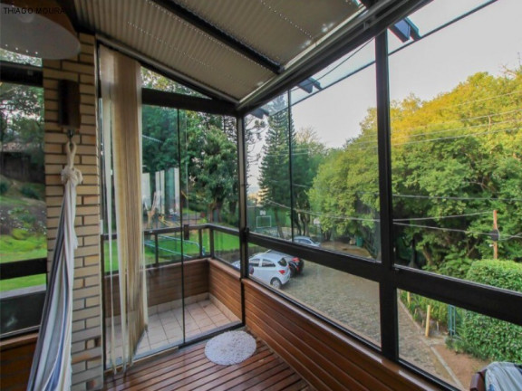Imagem Sobrado com 4 Quartos à Venda, em Nonoai - Porto Alegre Imagem Sobrado com 4 Quartos à Venda, em Nonoai - Porto Alegre