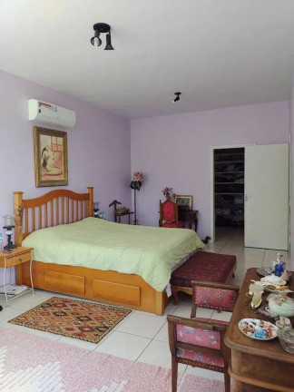 Imagem Casa com 4 Quartos à Venda, 329 m² em Vila Nova - Porto Alegre
