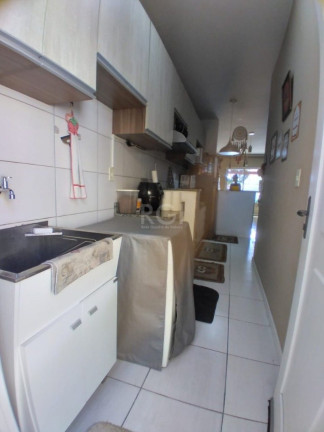 Imagem Imóvel com 3 Quartos à Venda, em Hípica - Porto Alegre Imagem Imóvel com 3 Quartos à Venda, em Hípica - Porto Alegre