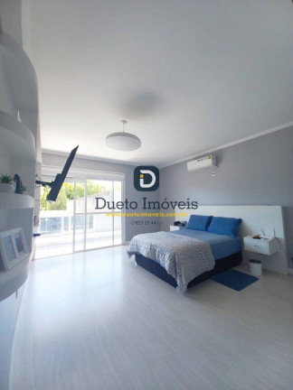 Imagem Casa com 4 Quartos à Venda, 303 m² em Juscelino Kubitschek - Santa Maria
