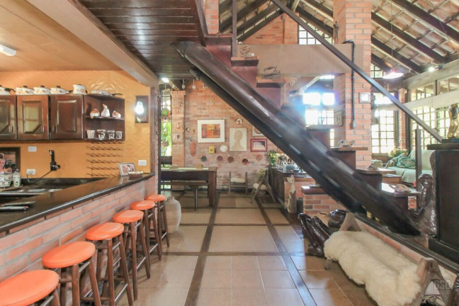 Imagem Casa com 4 Quartos à Venda, 200 m² em Vila Nova - Porto Alegre Imagem Casa com 4 Quartos à Venda, 200 m² em Vila Nova - Porto Alegre