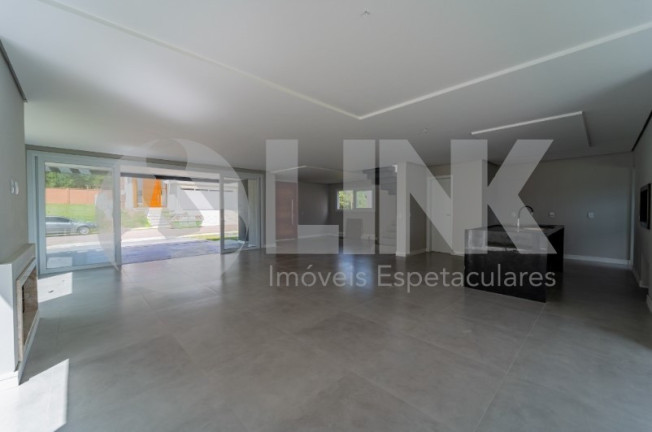 Imagem Imóvel com 3 Quartos à Venda, 300 m² em Vila Nova - Porto Alegre