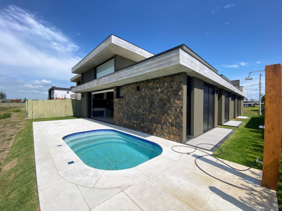 Imagem Casa com 4 Quartos à Venda, 215 m² em Marina - Capao Da Canoa Imagem Casa com 4 Quartos à Venda, 215 m² em Marina - Capao Da Canoa