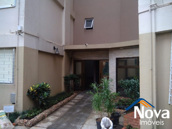 Imagem Imóvel com 2 Quartos à Venda, 79 m² em Santo Antônio - Porto Alegre Imagem Imóvel com 2 Quartos à Venda, 79 m² em Santo Antônio - Porto Alegre