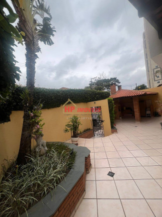 Imagem Casa com 4 Quartos à Venda, 299 m² em Vila Osasco - Osasco