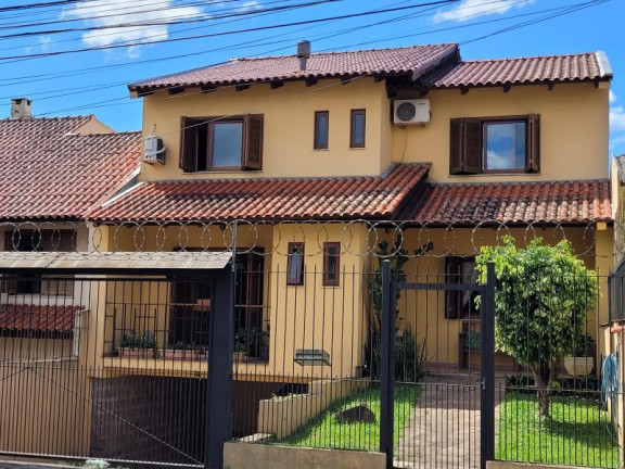 Imagem Casa com 3 Quartos à Venda, 287 m² em Tristeza - Porto Alegre Imagem Casa com 3 Quartos à Venda, 287 m² em Tristeza - Porto Alegre