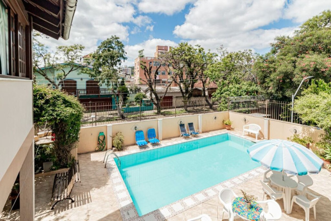 Imagem Casa com 3 Quartos à Venda, 270 m² em Partenon - Porto Alegre Imagem Casa com 3 Quartos à Venda, 270 m² em Partenon - Porto Alegre