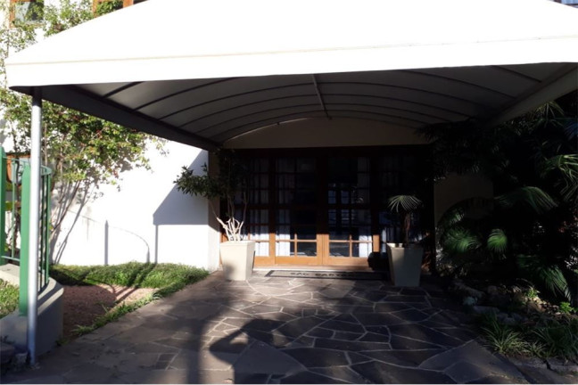 Imagem Casa com 4 Quartos à Venda,  em Teresópolis - Porto Alegre