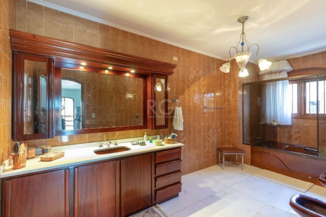 Imagem Imóvel com 4 Quartos à Venda, em Vila Assunção - Porto Alegre Imagem Imóvel com 4 Quartos à Venda, em Vila Assunção - Porto Alegre