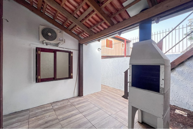 Imagem Casa com 2 Quartos à Venda, 45 m² em Olaria - Canoas Imagem Casa com 2 Quartos à Venda, 45 m² em Olaria - Canoas
