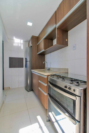 Imagem Imóvel com 2 Quartos à Venda, 59 m² em Vila Nova - Porto Alegre Imagem Imóvel com 2 Quartos à Venda, 59 m² em Vila Nova - Porto Alegre