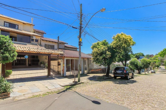 Imagem Casa com 3 Quartos à Venda, 198 m² em Cavalhada - Porto Alegre Imagem Casa com 3 Quartos à Venda, 198 m² em Cavalhada - Porto Alegre