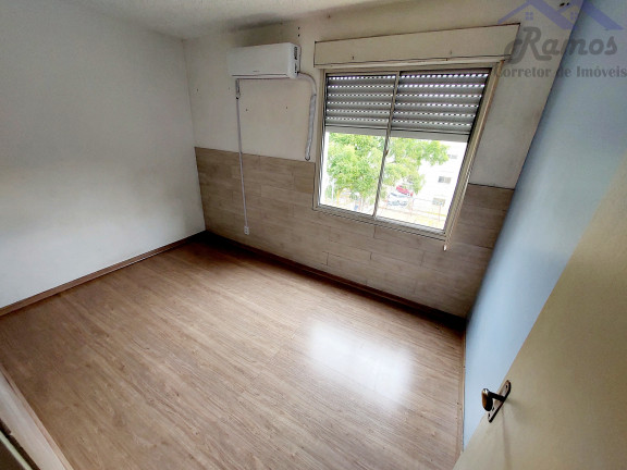 Imagem Imóvel com 2 Quartos à Venda, 50 m² em Vila Nova - Porto Alegre Imagem Imóvel com 2 Quartos à Venda, 50 m² em Vila Nova - Porto Alegre