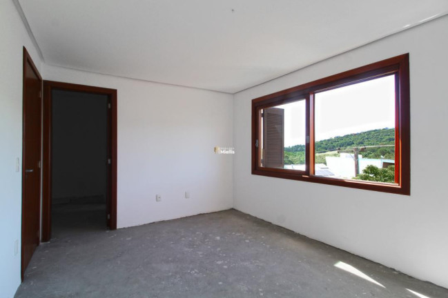 Imagem Casa com 3 Quartos à Venda, 240 m² em Vila Nova - Porto Alegre Imagem Casa com 3 Quartos à Venda, 240 m² em Vila Nova - Porto Alegre