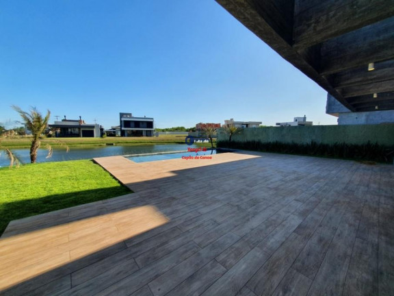 Imagem Casa de Condomínio com 5 Quartos à Venda, 280 m² em Capão Novo - Capão Da Canoa