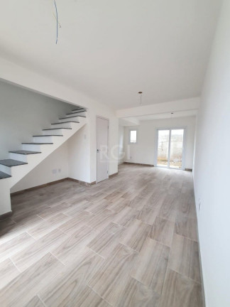 Imagem Casa de Condomínio com 2 Quartos à Venda, 64 m² em Vila Nova - Porto Alegre Imagem Casa de Condomínio com 2 Quartos à Venda, 64 m² em Vila Nova - Porto Alegre