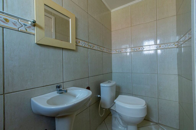 Imagem Casa com 4 Quartos à Venda, 165 m² em Igara - Canoas Imagem Casa com 4 Quartos à Venda, 165 m² em Igara - Canoas