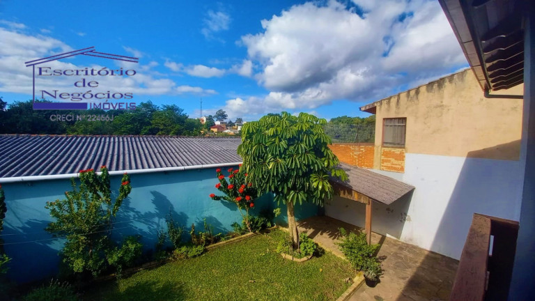 Imagem Casa com 4 Quartos à Venda, 260 m² em Vila Nova - Porto Alegre Imagem Casa com 4 Quartos à Venda, 260 m² em Vila Nova - Porto Alegre