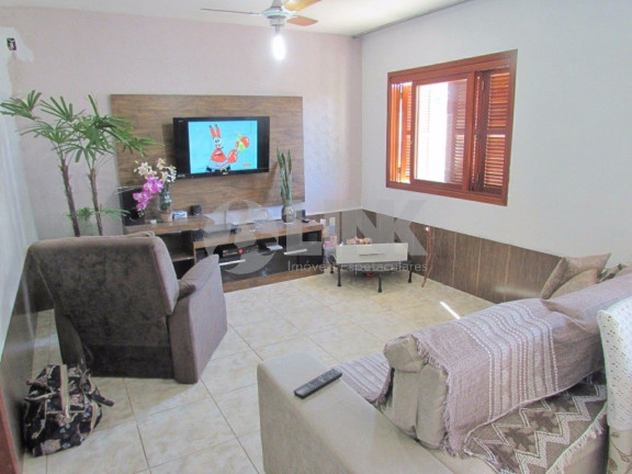 Imagem Casa com 4 Quartos à Venda, 200 m² em Jardim Carvalho - Porto Alegre Imagem Casa com 4 Quartos à Venda, 200 m² em Jardim Carvalho - Porto Alegre