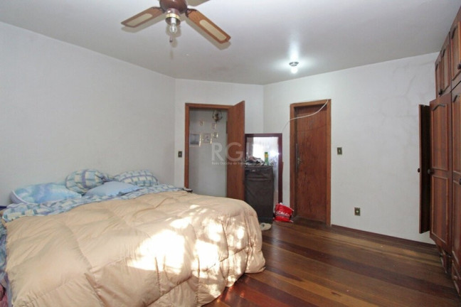 Imagem Casa com 4 Quartos à Venda, 300 m² em Glória - Porto Alegre Imagem Casa com 4 Quartos à Venda, 300 m² em Glória - Porto Alegre