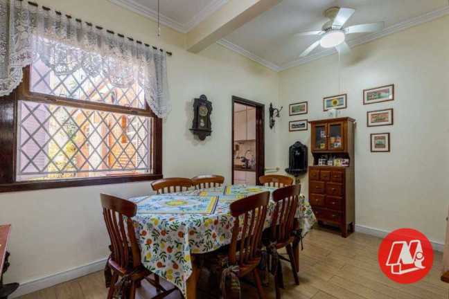 Imagem Casa com 5 Quartos à Venda, 337 m² em Rio Branco - Porto Alegre Imagem Casa com 5 Quartos à Venda, 337 m² em Rio Branco - Porto Alegre