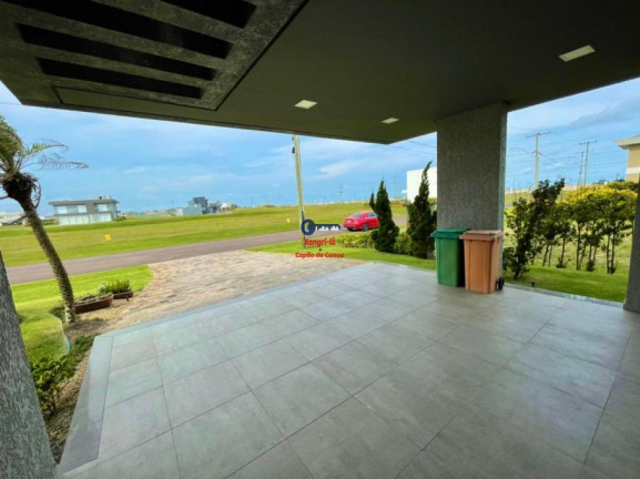 Imagem Casa de Condomínio com 4 Quartos à Venda, 300 m² em Capão Novo - Capão Da Canoa