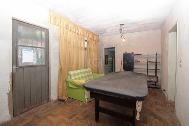 Imagem Casa com 4 Quartos à Venda, 300 m² em Glória - Porto Alegre Imagem Casa com 4 Quartos à Venda, 300 m² em Glória - Porto Alegre