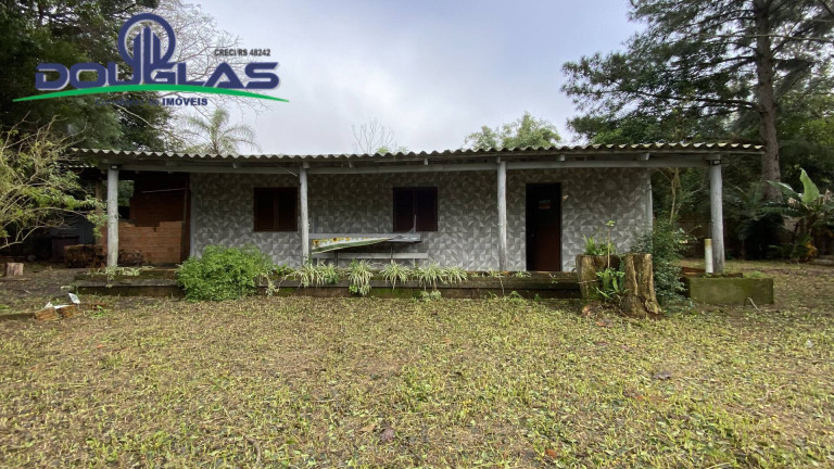 Imagem Casa com 4 Quartos à Venda, 1.500 m² em águas Claras - Viamão