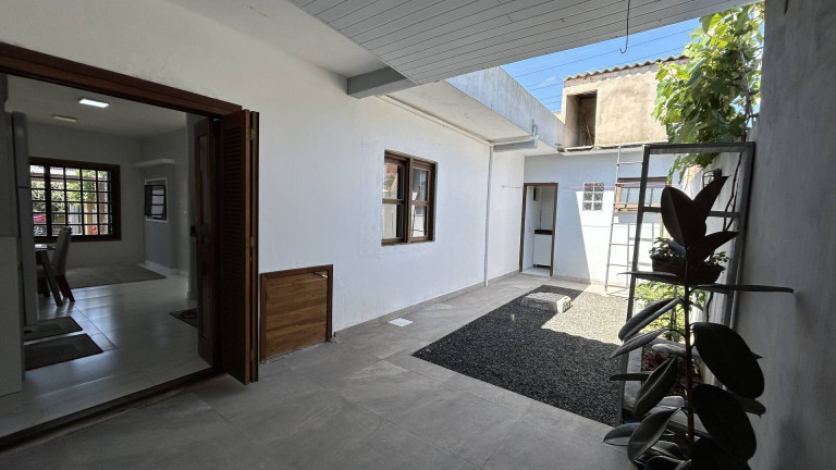 Imagem Casa com 2 Quartos à Venda, 57 m² em Igara - Canoas Imagem Casa com 2 Quartos à Venda, 57 m² em Igara - Canoas