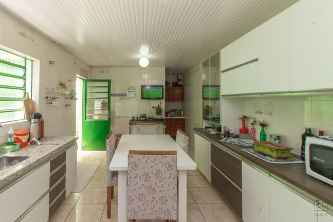 Imagem Casa com 3 Quartos à Venda, 216 m² em Vila Nova - Porto Alegre Imagem Casa com 3 Quartos à Venda, 216 m² em Vila Nova - Porto Alegre