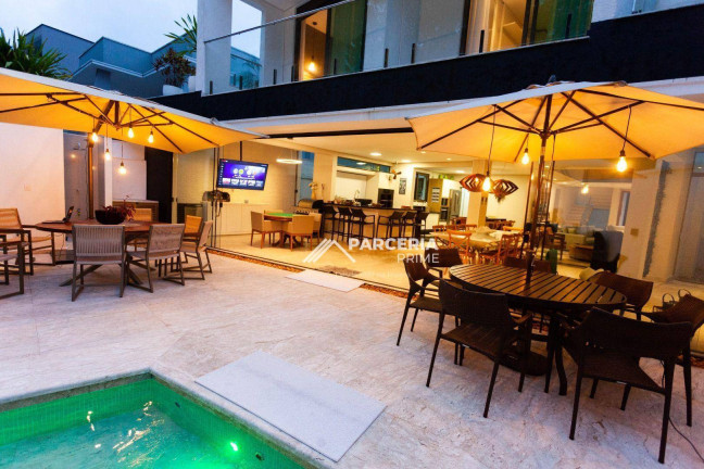 Imagem Casa com 6 Quartos à Venda, 450 m² em Riviera Módulo 21 - Bertioga Imagem Casa com 6 Quartos à Venda, 450 m² em Riviera Módulo 21 - Bertioga