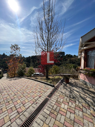 Imagem Casa de Condomínio com 4 Quartos à Venda, 260 m² em Vale Encantado - Campos Do Jordão
