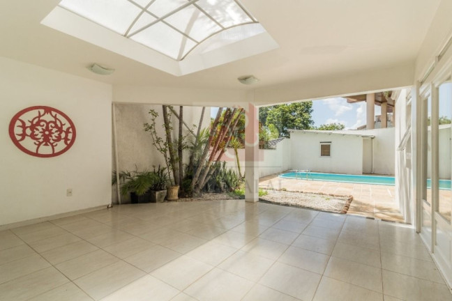 Imagem Casa com 4 Quartos à Venda, 250 m² em Menino Deus - Porto Alegre Imagem Casa com 4 Quartos à Venda, 250 m² em Menino Deus - Porto Alegre