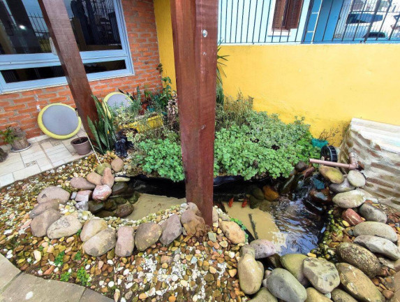 Imagem Casa com 3 Quartos à Venda, 150 m² em Mário Quintana - Porto Alegre