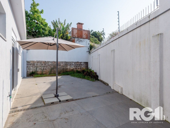 Imagem Casa com 3 Quartos à Venda, 400 m² em Três Figueiras - Porto Alegre Imagem Casa com 3 Quartos à Venda, 400 m² em Três Figueiras - Porto Alegre