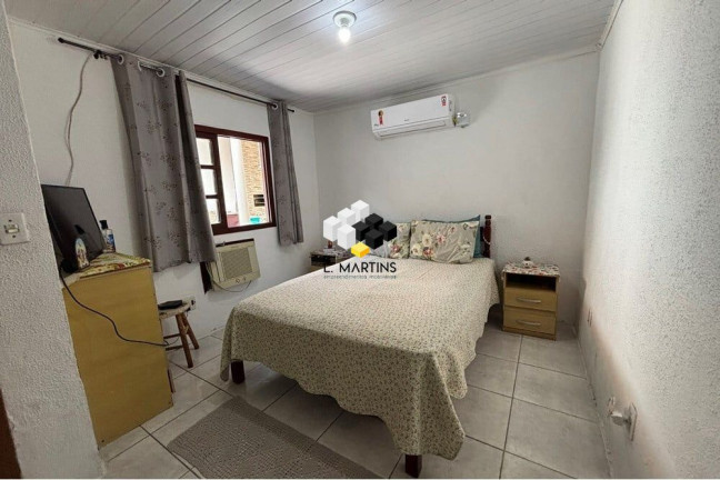 Imagem Casa com 2 Quartos à Venda, 98 m² em Guajuviras - Canoas Imagem Casa com 2 Quartos à Venda, 98 m² em Guajuviras - Canoas